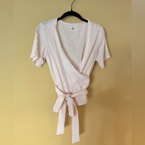 Light pink wrap top